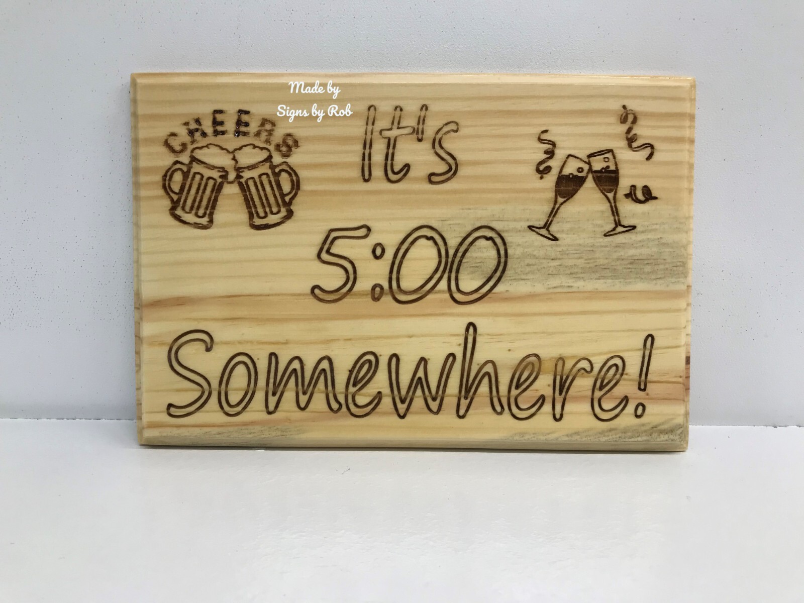 5.5″ x 8″ custom made wood ” It’s 5:00 Somewhere ” sign. Makes great gifts.