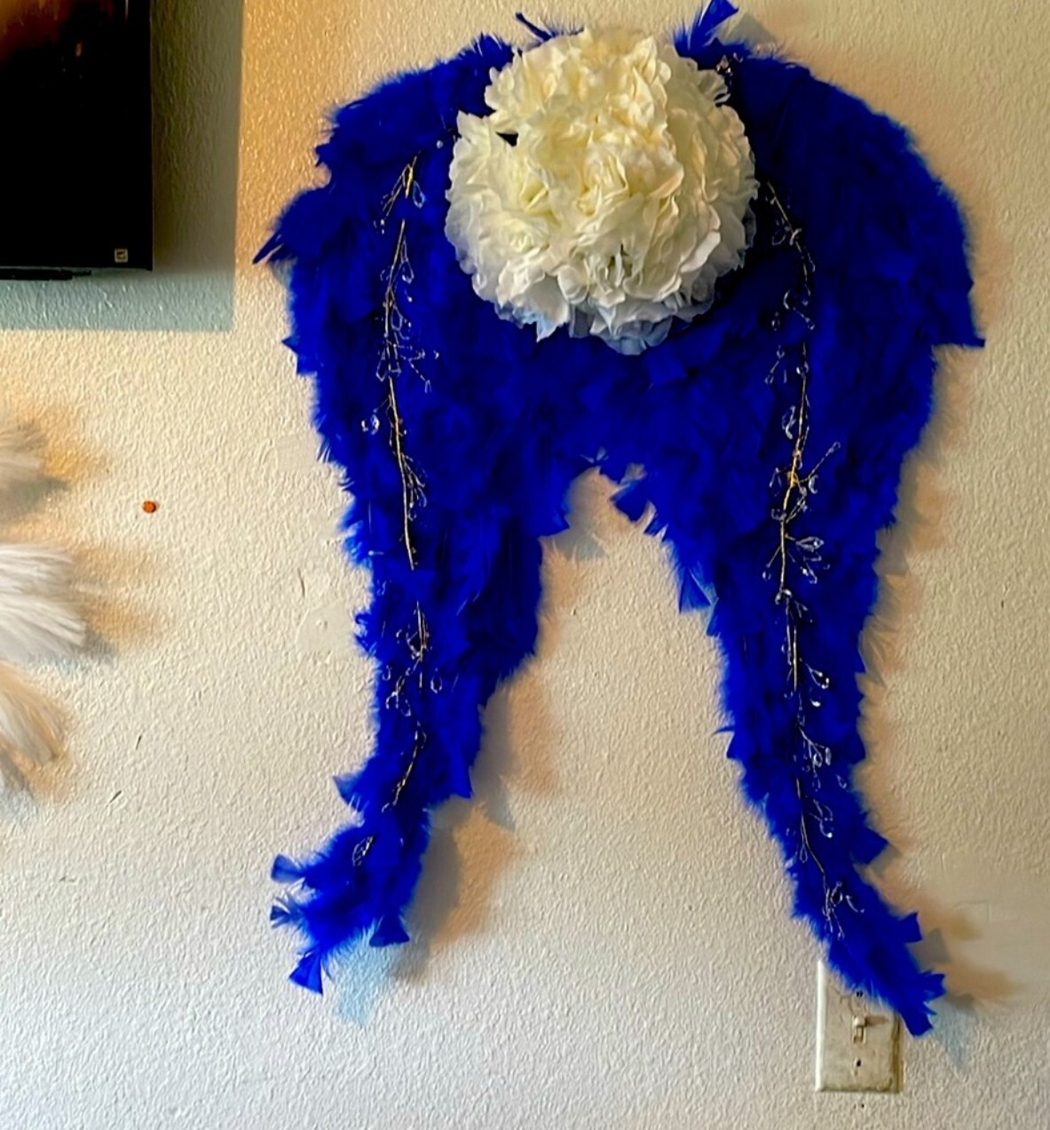 angel wings wall decor, in many different colors, and