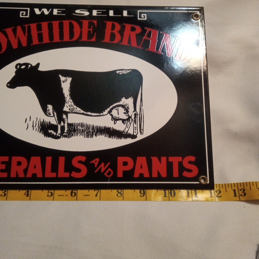 We Sell Cowhide Brand Overalls And Pants Sign 9 In By 12 In Vintage