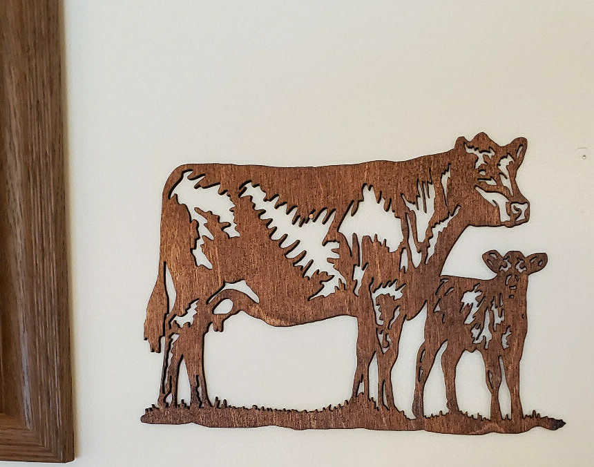 Beautiful Custom made Cows accent for your picture arrangements.