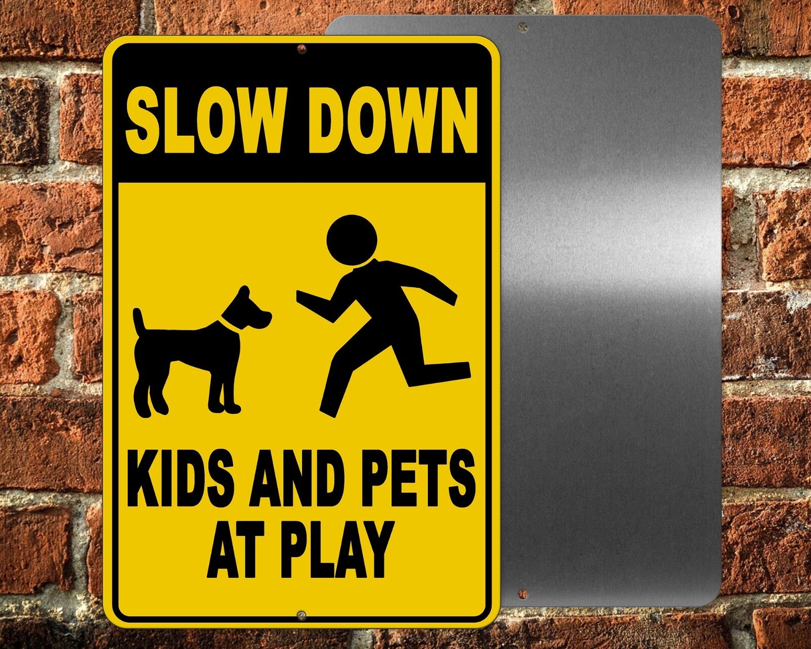 Kids and Pets at Play Slow Down Metal Sign warning children in area