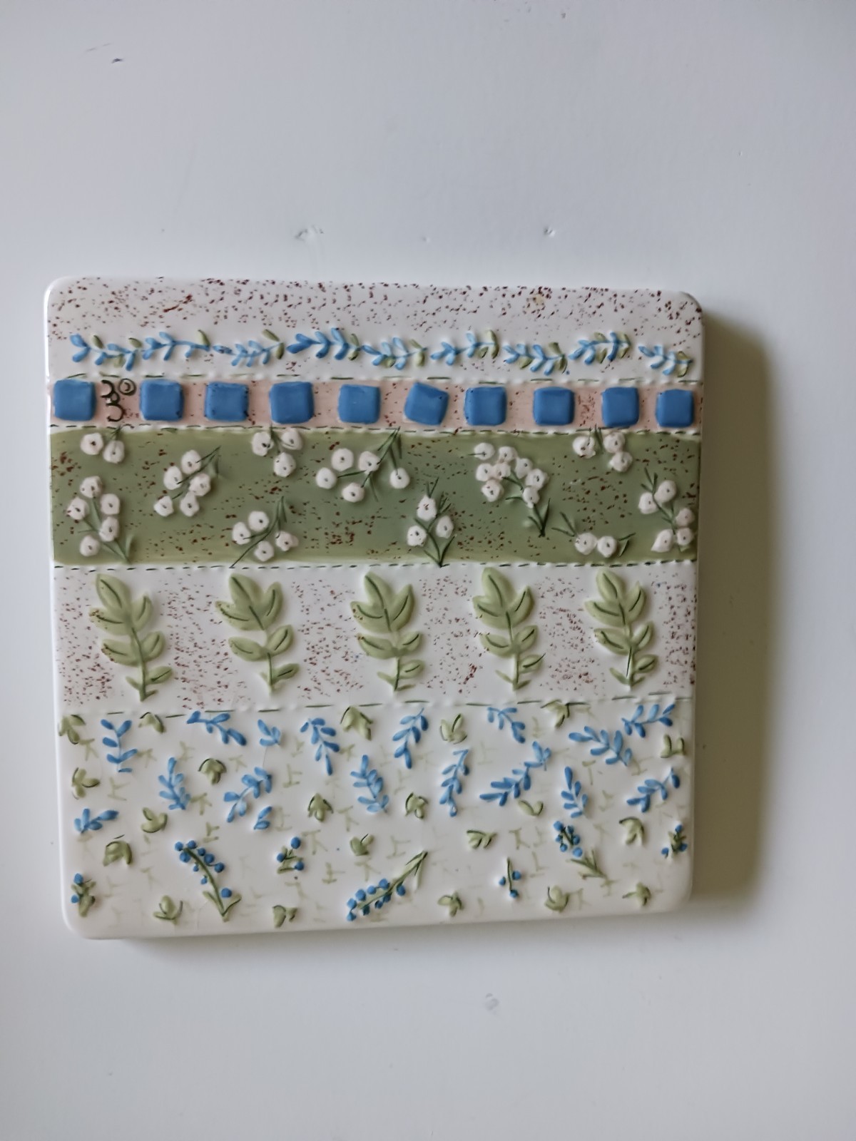 Vintage Decorative Tile featuring a Raised, Textured Design Floral 5.5 X 5.5 In.
