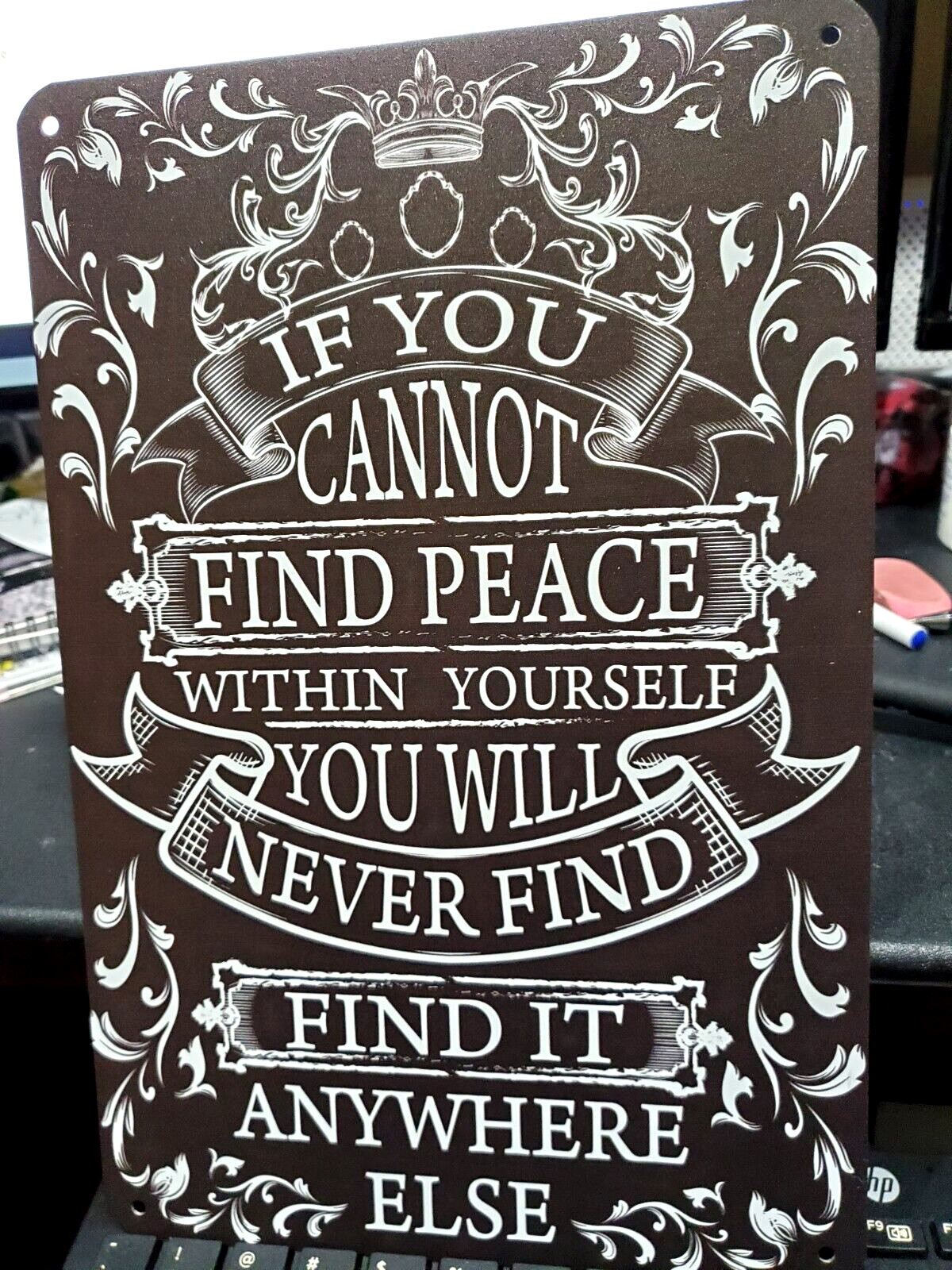 Metal sign IF YOU CANNOT FIND PEACE WITHIN YOURSELF NEVER ANYWHERE ELSE