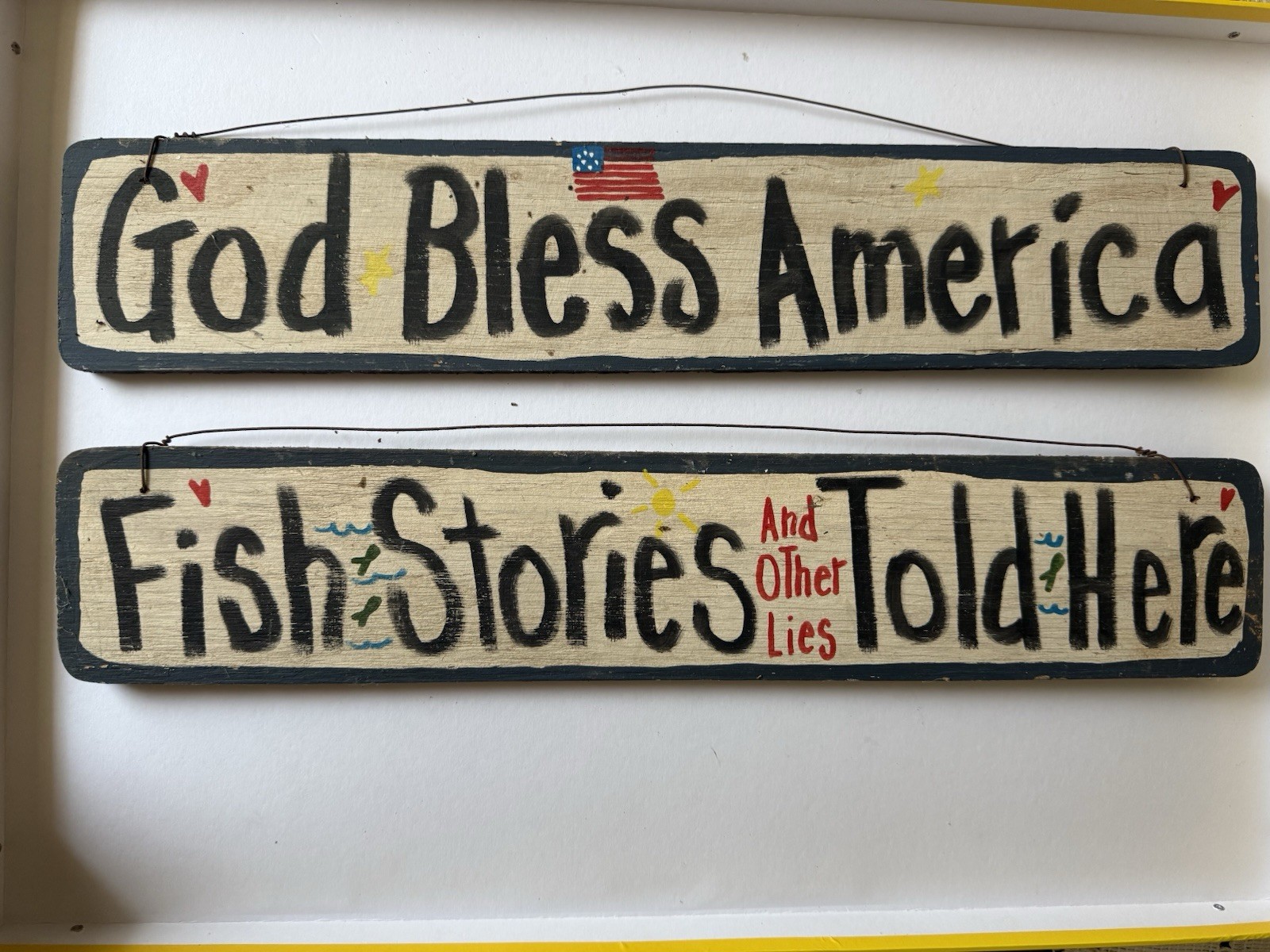 2pc Rustic Wood Hanging Sign Set: God Bless America & Fish Stories Told Here