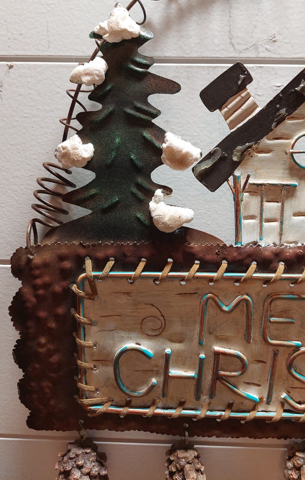 Winter rustic cabin forest scene “Merry Xmas” wall hanging w/dangling pine cones
