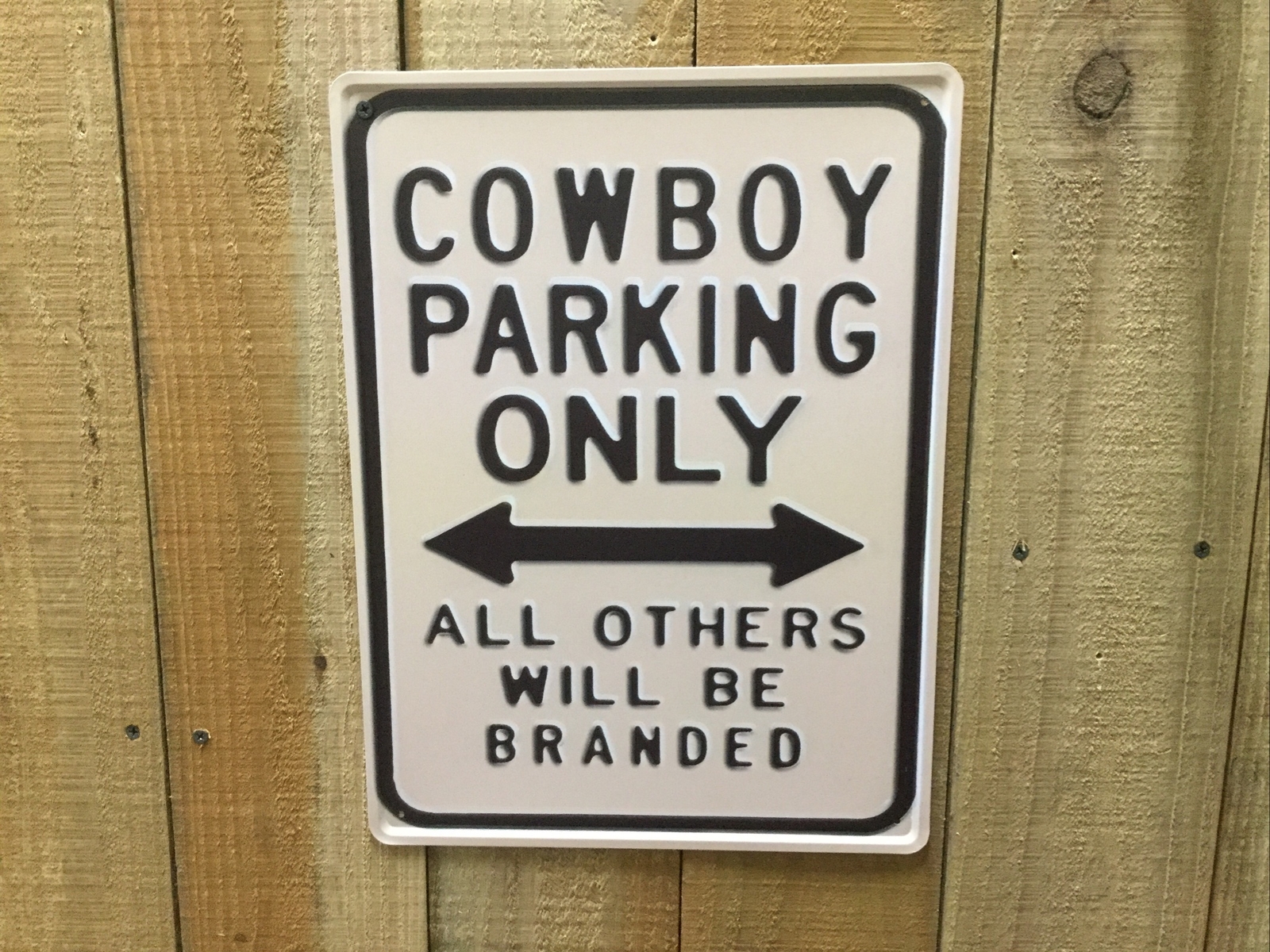 Tin Sign “Cowboy Parking Only, All Others Will Be Branded”. 201- 9037