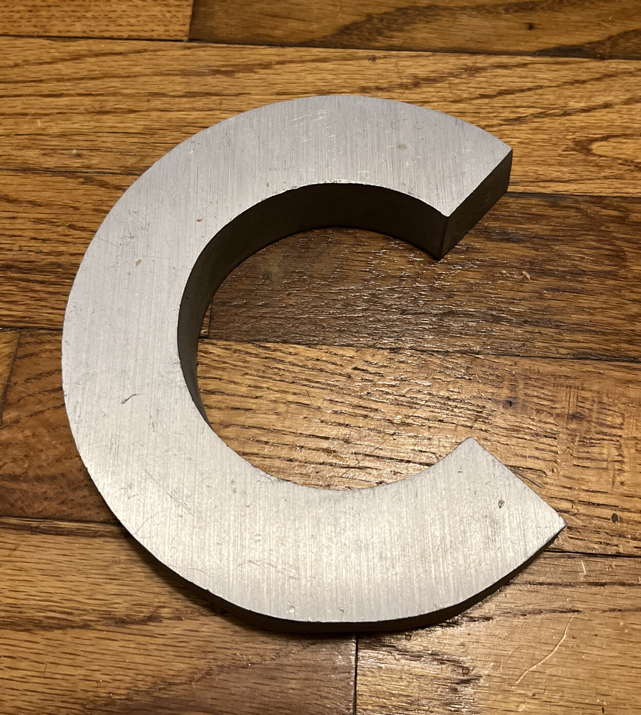 Vintage Industrial Aluminum Metal Sign Letter C, 6.25in. tall x 5.5in. wide.